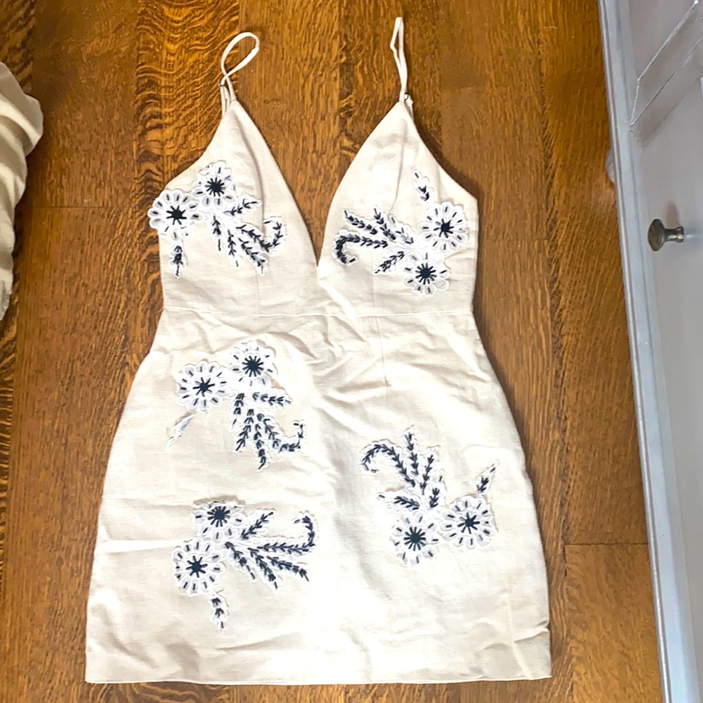 Low cut v neck embroidered mini dress